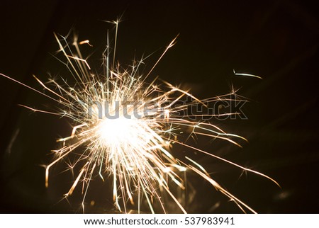 Magic glowing Flow of Sparks in the Dark. Sparks