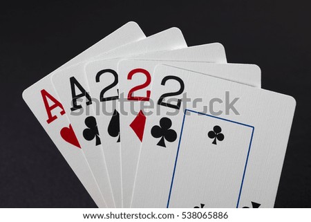 Full house poker hand isolated on black background