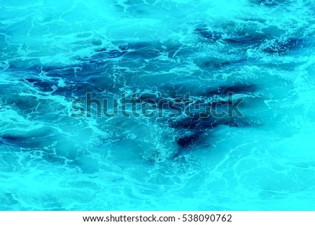 Atlantic ocean with turquoise blue water on a sunny day. Waves, foam, wake caused by cruise ship, color effect filtered image for tourism business concept, cruise sailing blogs, magazines websites