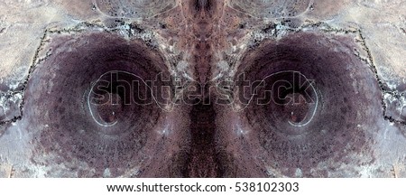 the eyes of death, Tribute to Dalí, abstract symmetrical photograph of the deserts of Africa from the air, aerial view, abstract expressionism,mirror effect, symmetry,