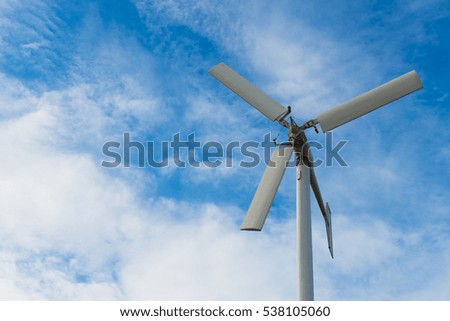 turbine for energy generator and reserve on blue sky
