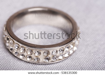 Closeup macro wedding diamond ring blurred background