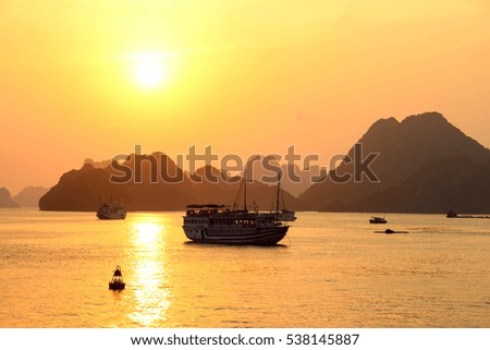 Sunset in Ha Long Bay. A UNESCO World Heritage Site and popular travel destination in Vietnam, South East Asia