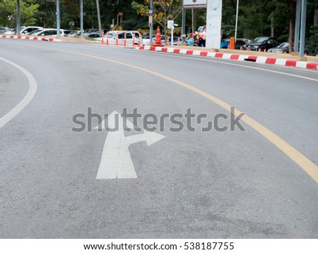 Arrow pointing straight ahead and turn right ,traffic sign which show on the road, arrows go straight on and turn left or turn right, Traffic sign show the turn right and go straight
