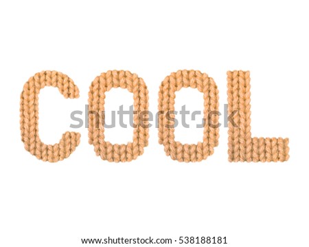 Cool word on a blurry texture knitted pattern of woolen thread closeup. English alphabet. Typography design. Color orange