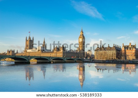 Big Ben and Westminster parliament with colorful sky and water reflection Royalty-Free Stock Photo #538189333