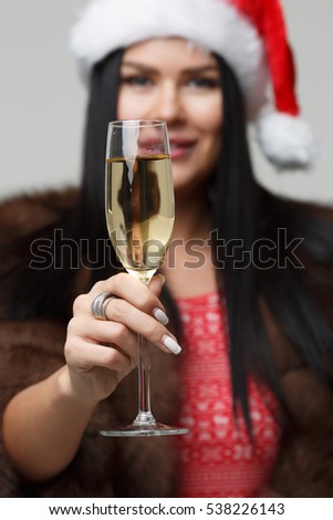 Christmas girl with champagne glass