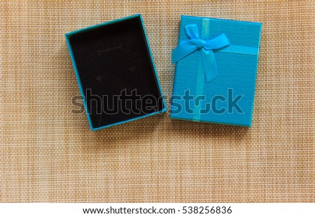 Blue gift box Background brown