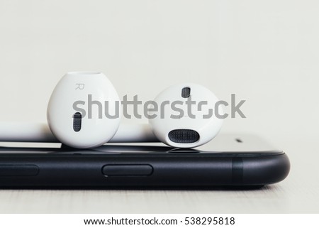 close-up headphone stack on new modern phone
