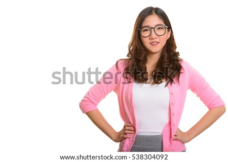 Young happy Asian woman looking motivated