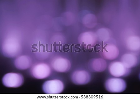 Blurred Purple Bokeh Background from Water Fountain Lightings Royalty-Free Stock Photo #538309516