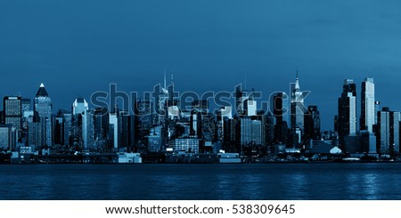 Midtown Manhattan skyline BW at dusk panorama over Hudson River