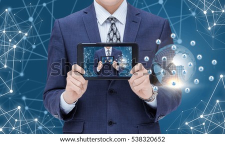 Businessman on the background of the business network shows on your computer.