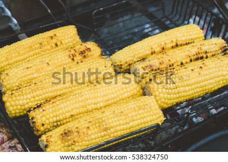 cooking corn on the grill, vegetarian cuisine. Useful lifestyle and nutrition