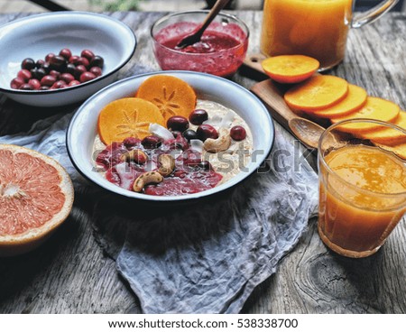 Warm oatmeal, Chia seed, vanilla and peanut butter in coconut milk topped with homemade cranberries sauce, cashew nut, crated coconut and persimmon. Serve with fresh orange, clementine and grapefruit.