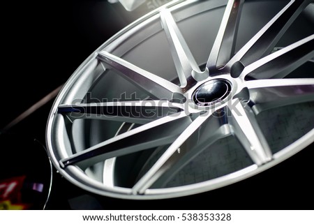 Second hand alloy wheels in store, selective focus. Royalty-Free Stock Photo #538353328