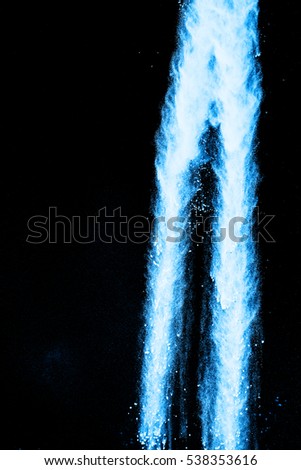 Blue powder explosion on white background. Mauve color cloud. Blue dust explode.