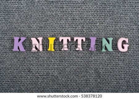 Knitting. Knitted Fabric Texture. Word composed from ABC alphabet letters. 