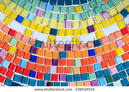 Beautiful colorful mosaic background. Old pattern creates a stunning image.Abstract geometric mosaic vintage ethnic seamless image ornamental. Pale colors.Selective focus. blur

