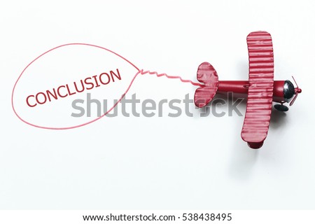 writing conclusion red toy airplane with talk bubble on white background Royalty-Free Stock Photo #538438495