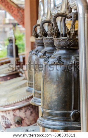 Many black bell outside the temple in Thailand