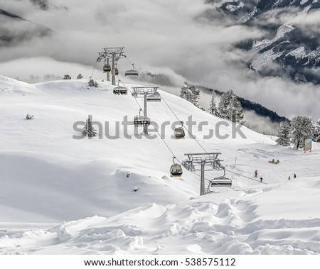 The view from the Penken on the ski chairlift on a sunny day - Mayrhofen region, Austria