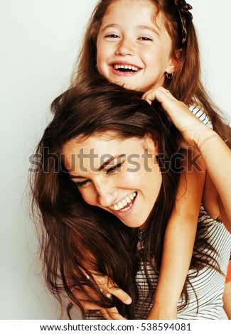 bright picture of hugging mother and daughter happy together, smiling stylish family. lifestyle people concept