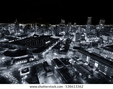 Aerial drone black and white cityscape of the capital city of Denver Colorado at night