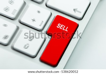 Computer notebook keyboard with sell key. E-commerce and new economy concept