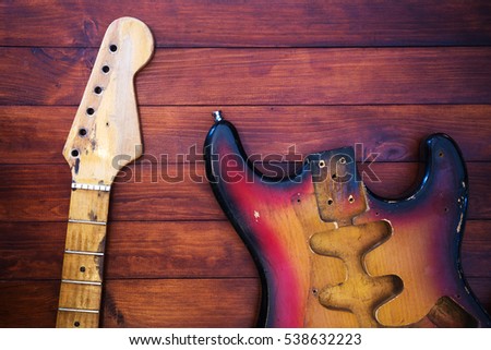 Disassembled parts of vintage guitars.