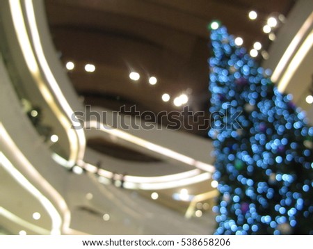 Christmas tree decoration interior in Shopping mall, abstract blur background