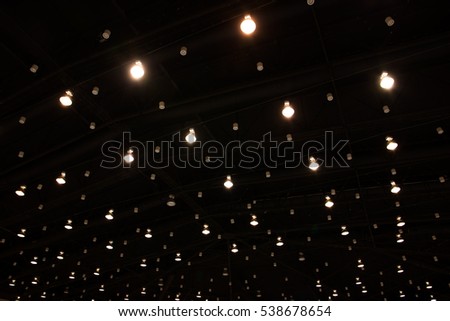 Exhibition hall with ceiling lights background