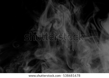 Abstract smoke Weipa. Personal vaporizers fragrant steam. The concept of alternative non-nicotine smoking. White smoke on a black background. E-cigarette. Evaporator. Taking Close-up. Vaping.