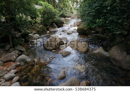 Waterfall flown through rock rushing over the stones, Phlio waterfall in Chanthaburi province, eastern of Thailand