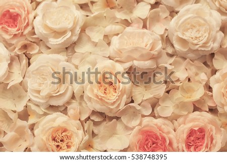 artificial flowers made of fabric attached to the canvas delicate pastel shades