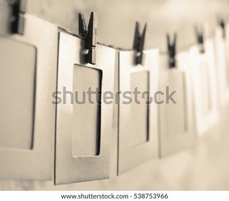 Blank photo frames on a washing line