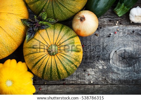Vegetables on wooden board, top view
