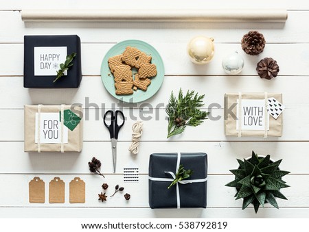 Elegant nordic retro christmas, wrapping station, desk view from above, DIY xmas concept