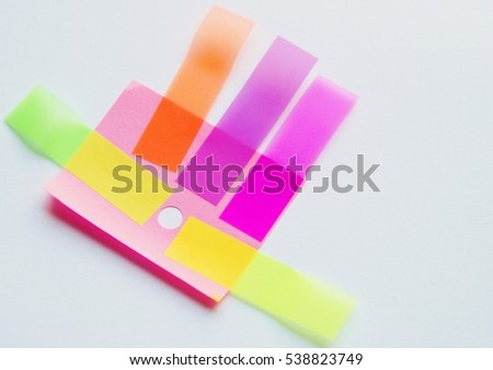 Preschool composition created with colorful self stick notes against a light grey background
