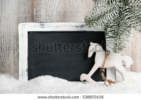 Christmas decoration with blank chalkboard