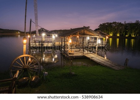 Thailand Landscape : Local tourism boat house on a river at night