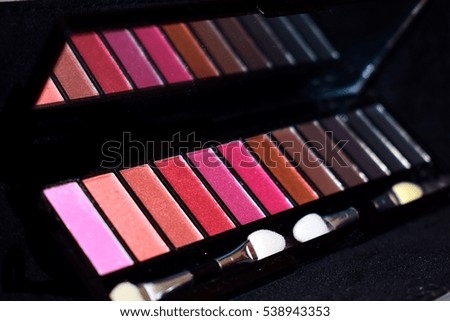 close up of assorted color makeup palettes
