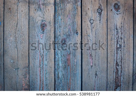 Old blue cracked painted wood background