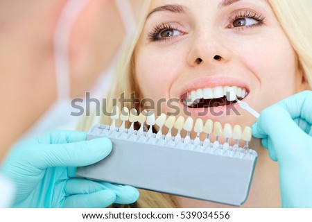 Closeup of a girl with beautiful smile at the dentist. Dental Royalty-Free Stock Photo #539034556