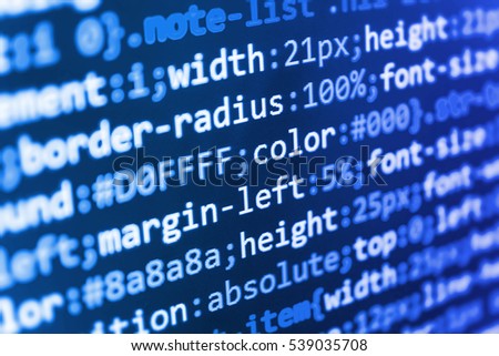 Webdesigner Workstation. Internet security hacker prevention. Developer working on websites codes in office. Software development. IT coding on monitor screen. Binary digits code editing. 
