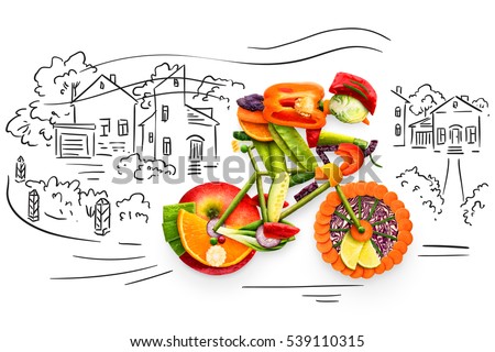 Healthy food concept of a cyclist riding a bike made of fresh vegetables and fruits, on sketchy background.  Royalty-Free Stock Photo #539110315