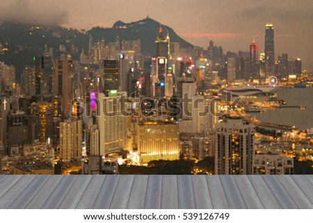 Opening wooden floor,  Blurred light Hong Kong city downtown night view