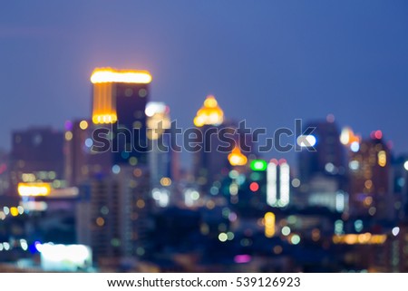 Blurred bokeh lights city office building night view