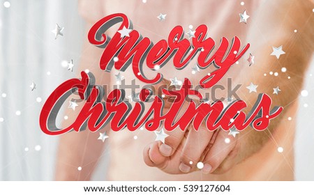 Businessman on blurred background touching floating christmas message with his finger 3D rendering