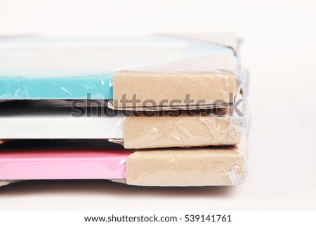 Picture frames in plastic packet.
